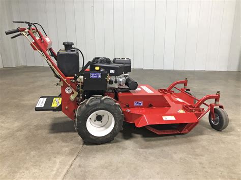 small tractor with brush hog